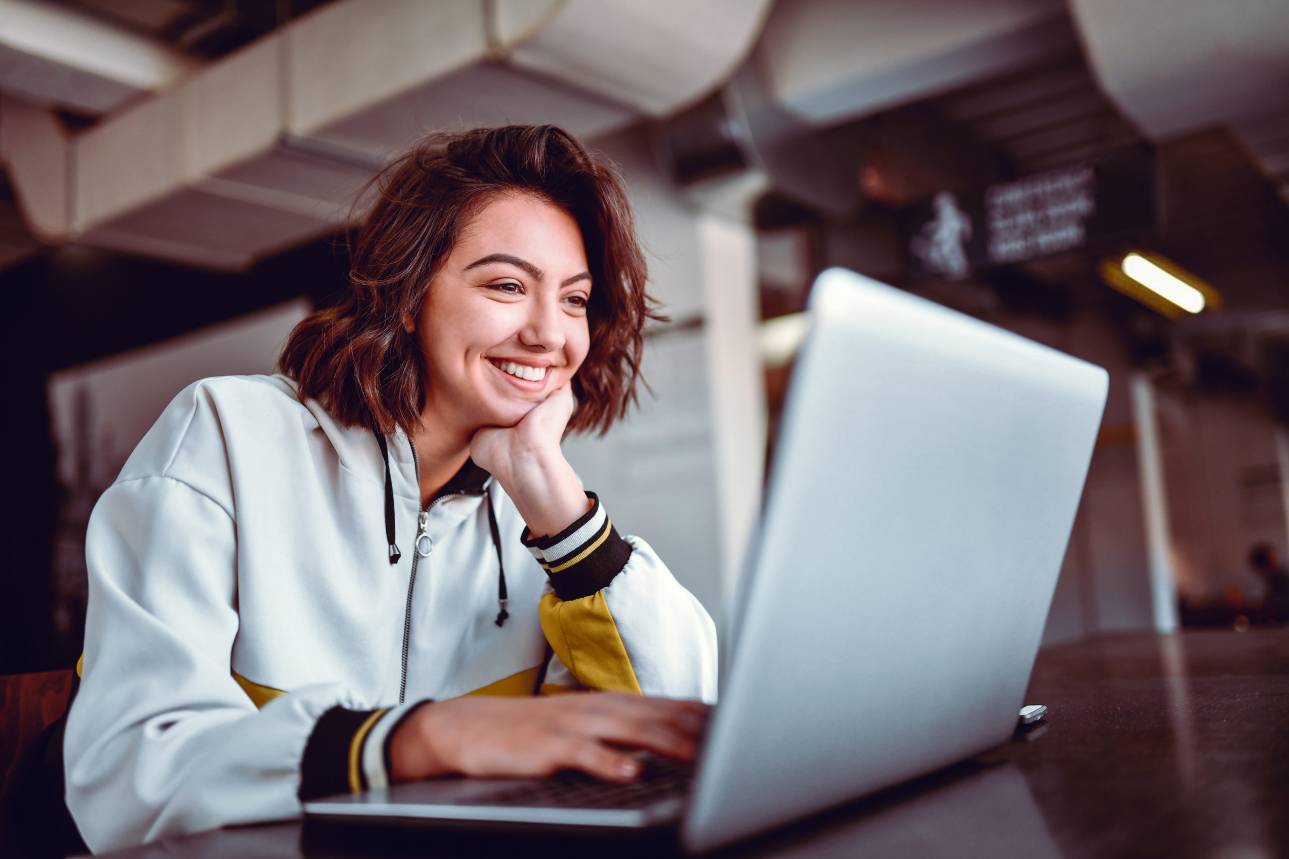 Female Studying On Laptop